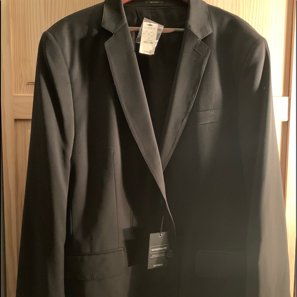 men’s black suit. New with tags, Brand is Express